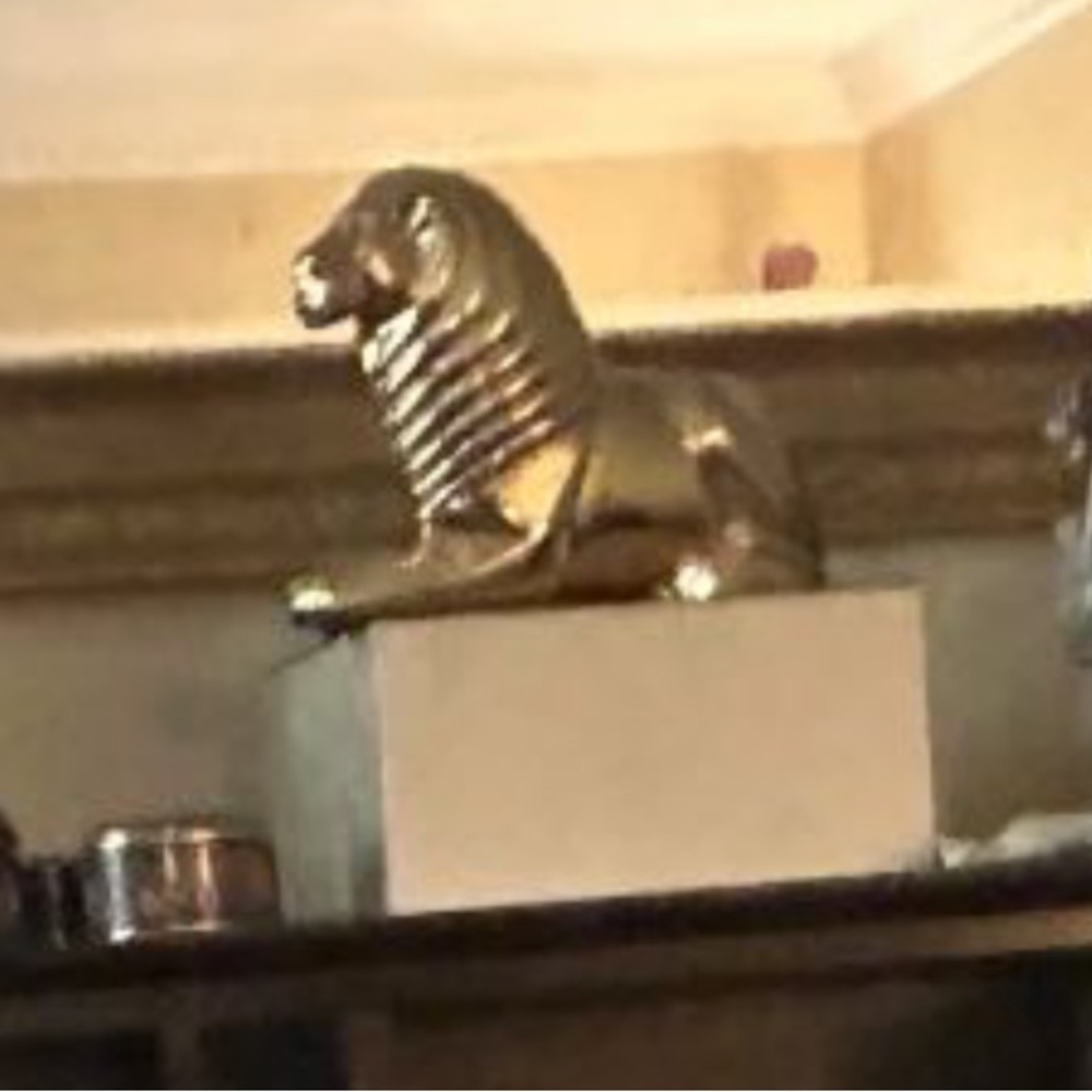 ISO large brass lion cat